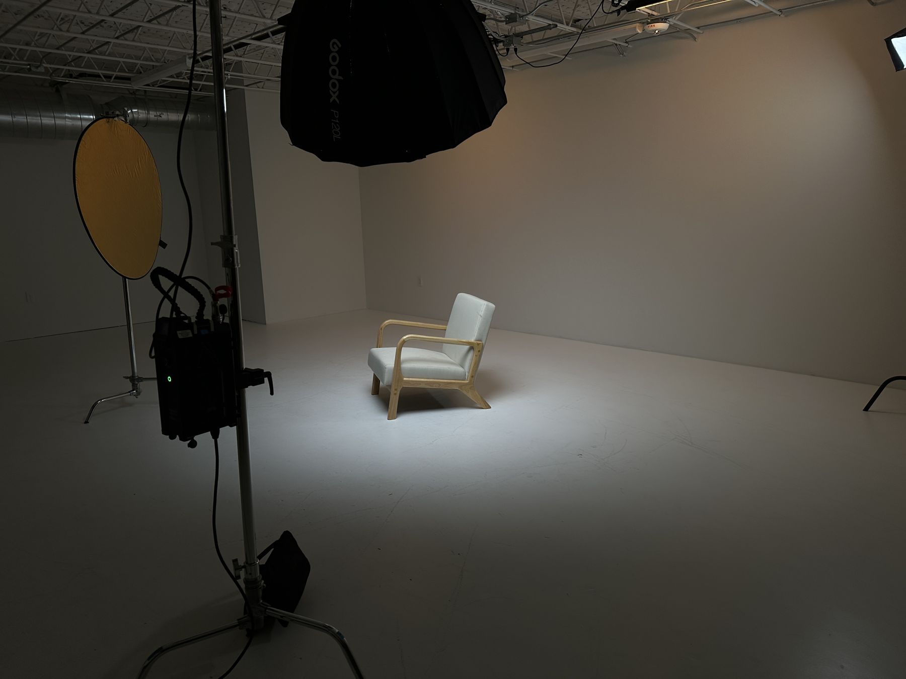 Armchair on the white cyc wall